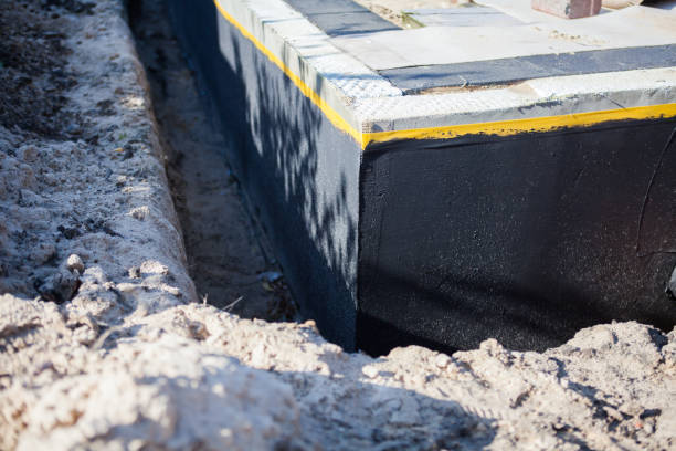 Professional Emergency Waterproofing technician working in Huntsville, TN